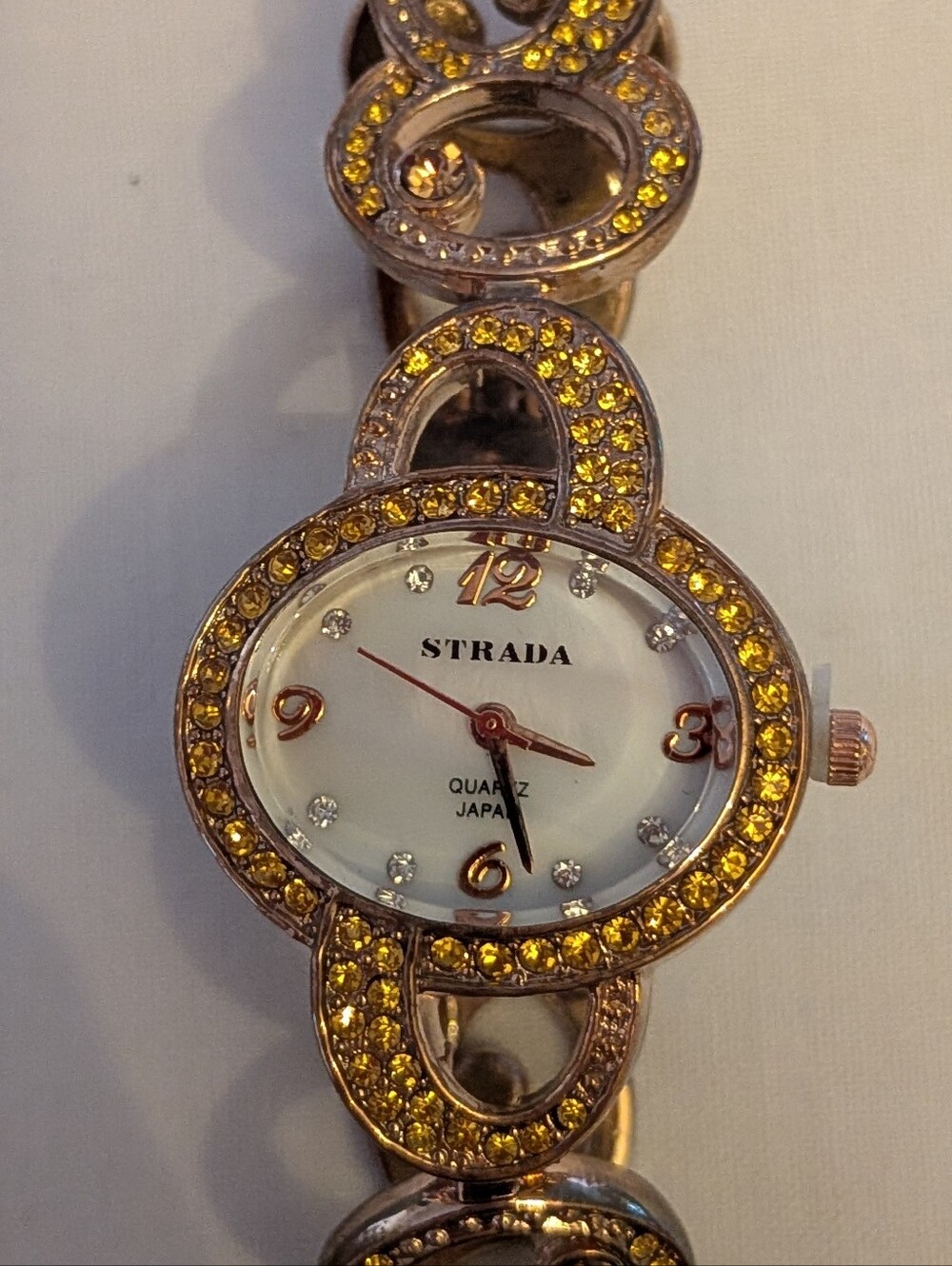 Strada Rose Tone Metal Women's Bracelet Watch with Sparkling Accents